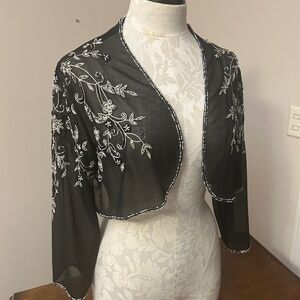 J KARA sheer black beaded and embroidered overlay, in beautiful condition.
